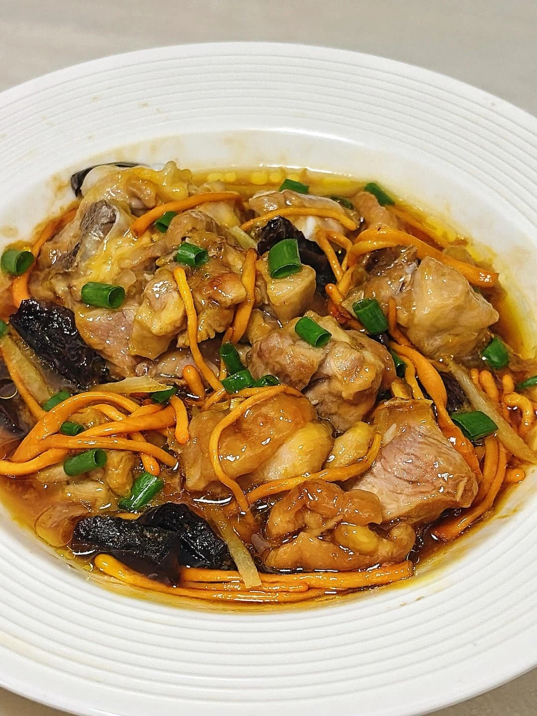 Steamed Chicken Leg with Cordyceps Flower — finished dish, ready to serve.