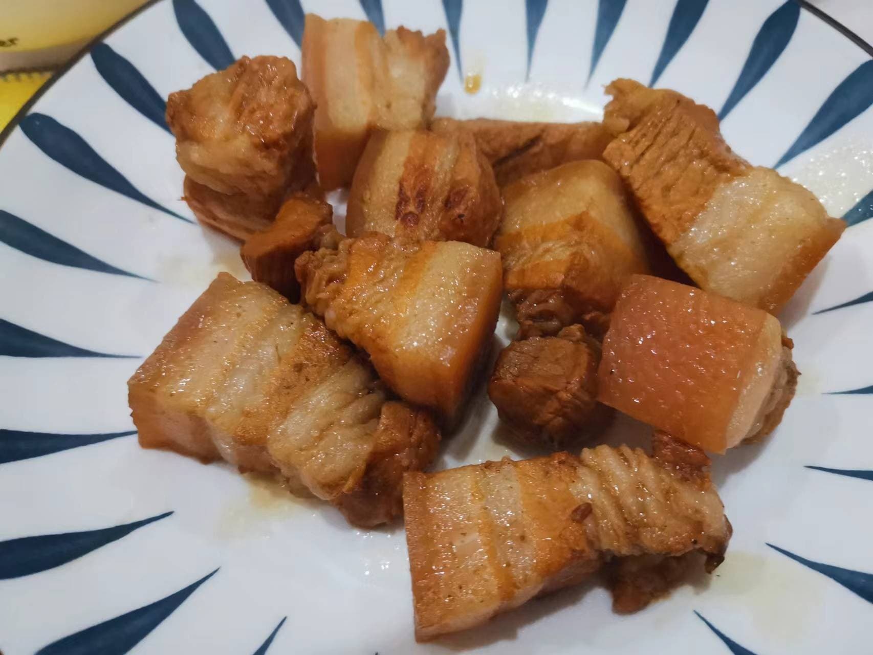 Red-braised pork belly in a glossy soy sauce glaze