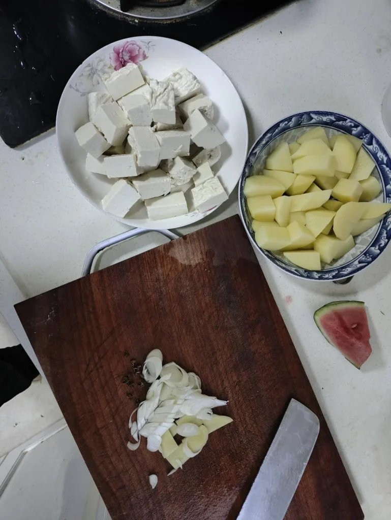 Chinese Breakfast – Congee, Sweet Potato, and Braised Potato with Tofu