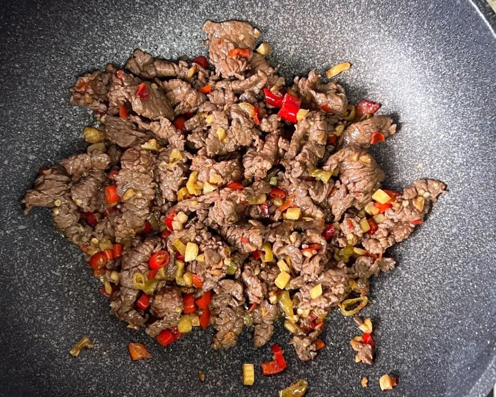 Stir-fried Yellow Beef with Cilantro and Chilies