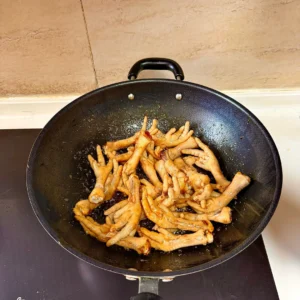 Spicy Braised Chicken Feet with Rice Cakes