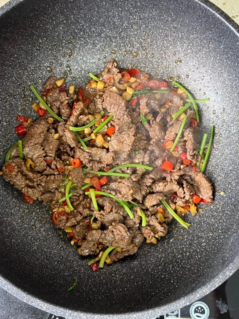 Stir-fried Yellow Beef with Cilantro and Chilies