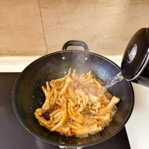 Spicy Braised Chicken Feet with Rice Cakes