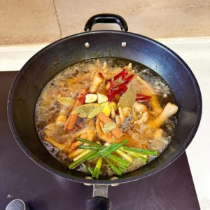 Spicy Braised Chicken Feet with Rice Cakes