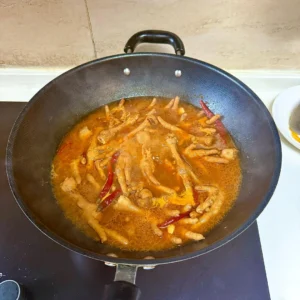 Spicy Braised Chicken Feet with Rice Cakes