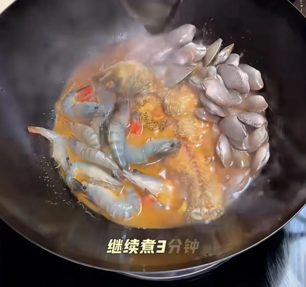 Braised Sea Bass with Shrimp and Clams