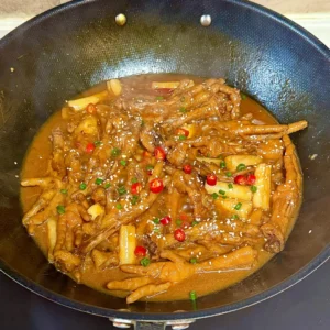 Spicy Braised Chicken Feet with Rice Cakes