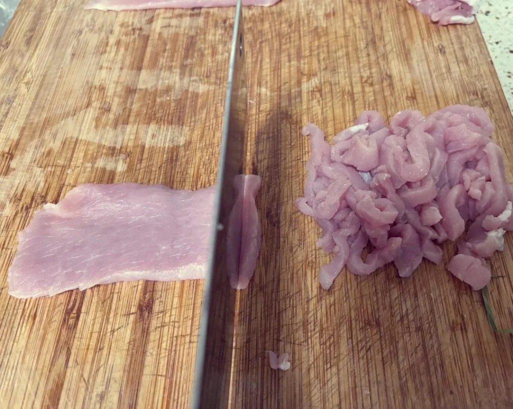 Stir-fried Garlic Scapes with Shredded Pork