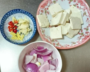 Tender Tofu and Sea Bass Clay Pot