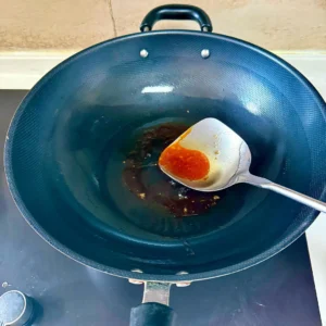 Spicy Braised Chicken Feet with Rice Cakes