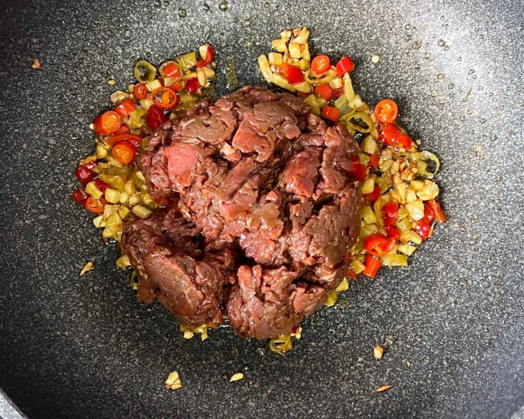 Stir-fried Yellow Beef with Cilantro and Chilies