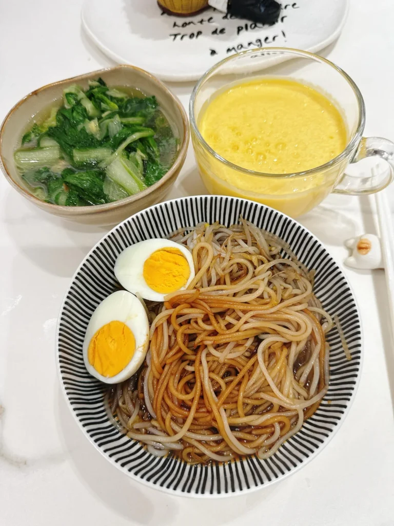 Breakfast: Scallion Oil Rice Noodles, Mango Smoothie, Soft-Centered Egg & Ginger Baby Bok Choy