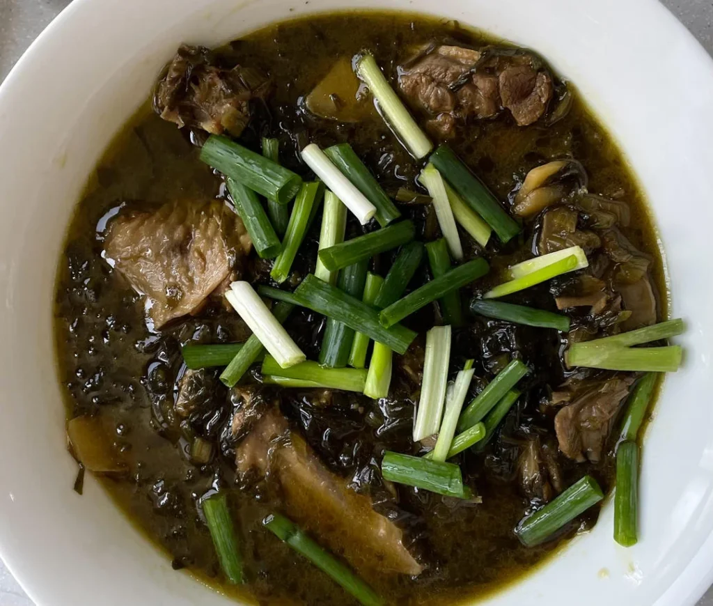 Braised Duck with Pickled Mustard Greens