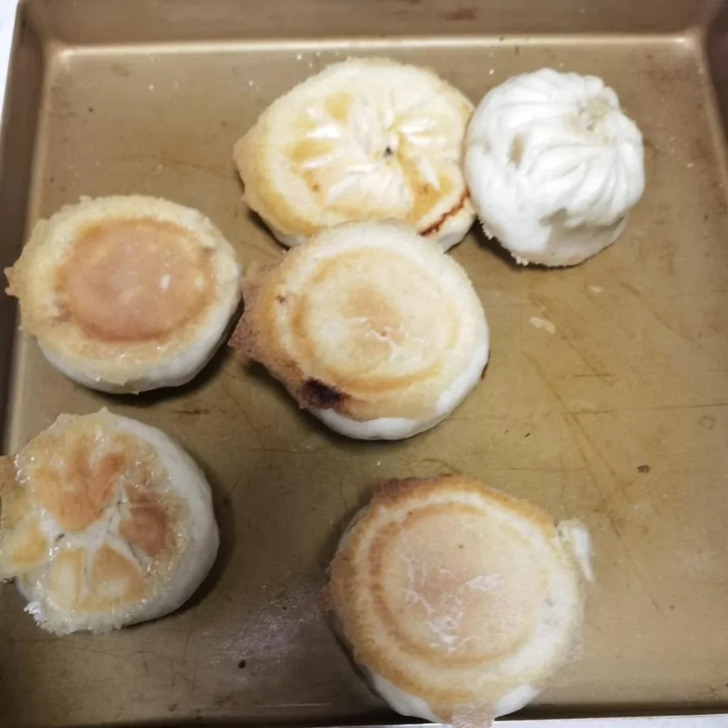 Locust Flower and Pork Steamed Buns