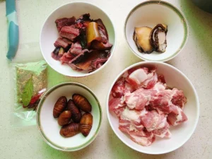 Steamed Silkworm Pupae, Eel, Abalone, and Pork Ribs