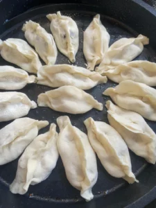 Chive and Pork & Scallion and Pork Potstickers