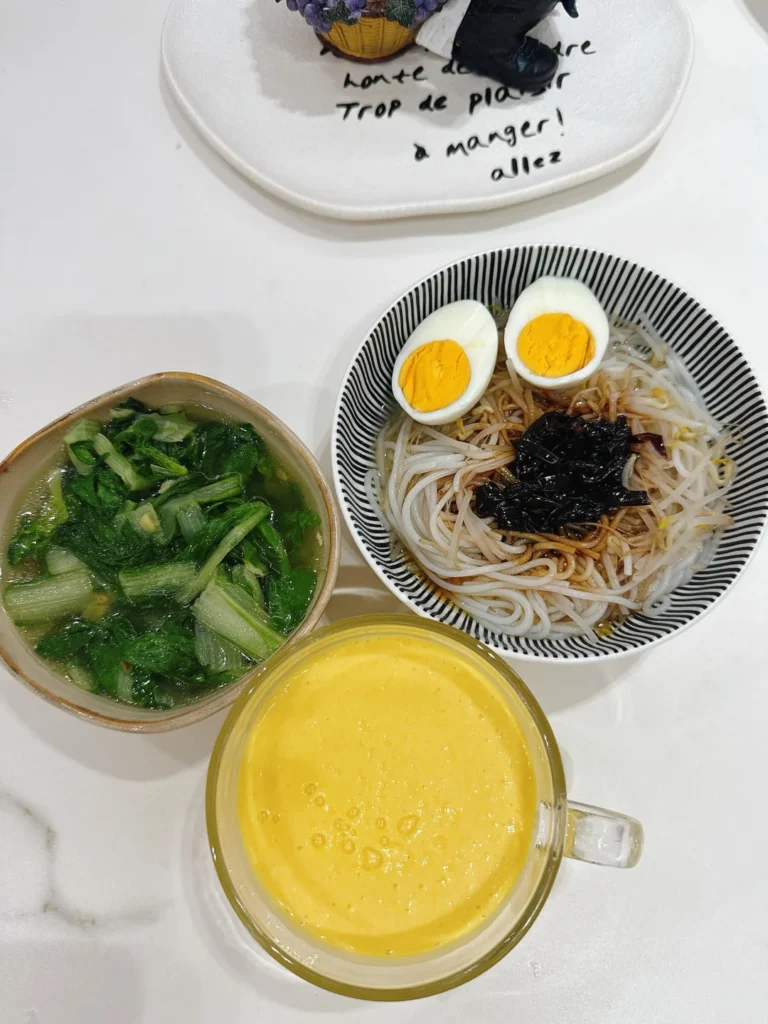 Breakfast: Scallion Oil Rice Noodles, Mango Smoothie, Soft-Centered Egg & Ginger Baby Bok Choy