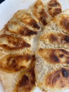 Chive and Pork & Scallion and Pork Potstickers