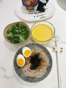 Breakfast: Scallion Oil Rice Noodles, Mango Smoothie, Soft-Centered Egg & Ginger Baby Bok Choy