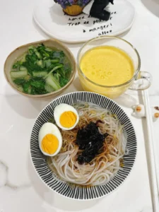 Breakfast: Scallion Oil Rice Noodles, Mango Smoothie, Soft-Centered Egg & Ginger Baby Bok Choy