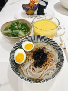 Breakfast: Scallion Oil Rice Noodles, Mango Smoothie, Soft-Centered Egg & Ginger Baby Bok Choy