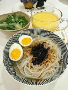 Breakfast: Scallion Oil Rice Noodles, Mango Smoothie, Soft-Centered Egg & Ginger Baby Bok Choy