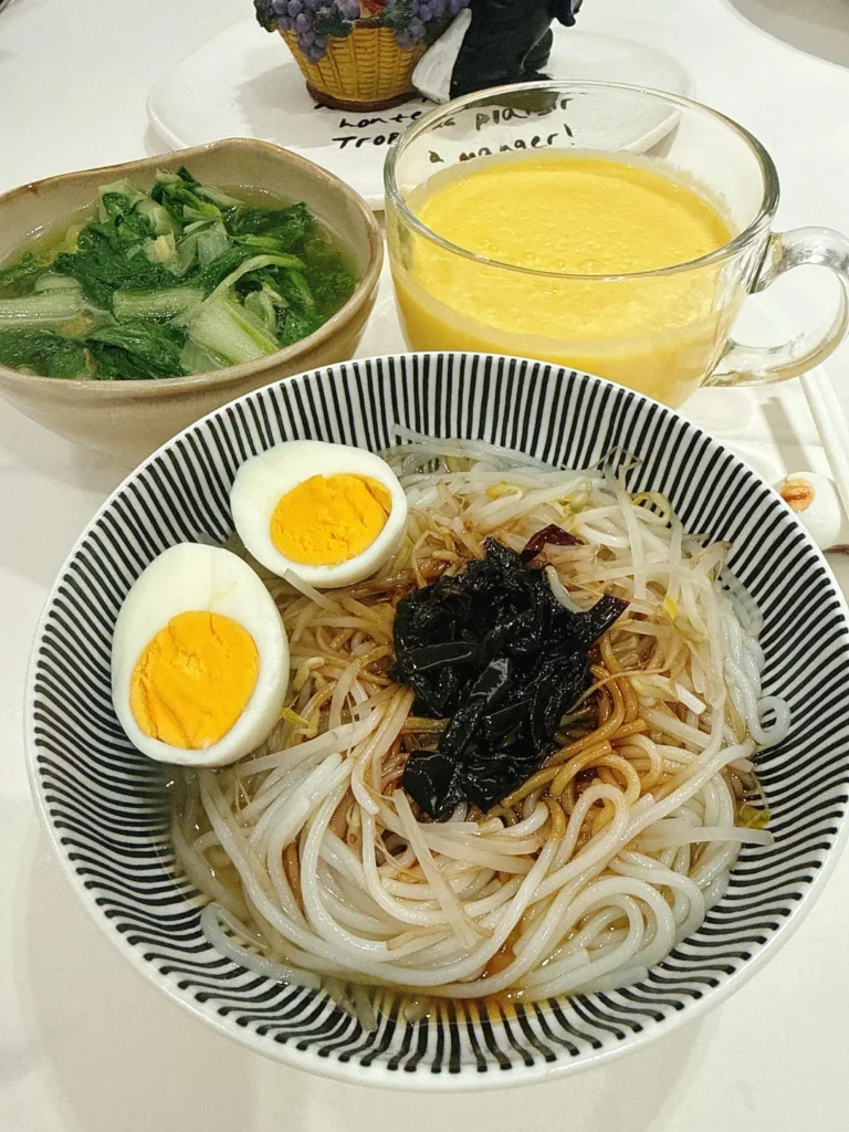 Breakfast: Scallion Oil Rice Noodles, Mango Smoothie, Soft-Centered Egg & Ginger Baby Bok Choy