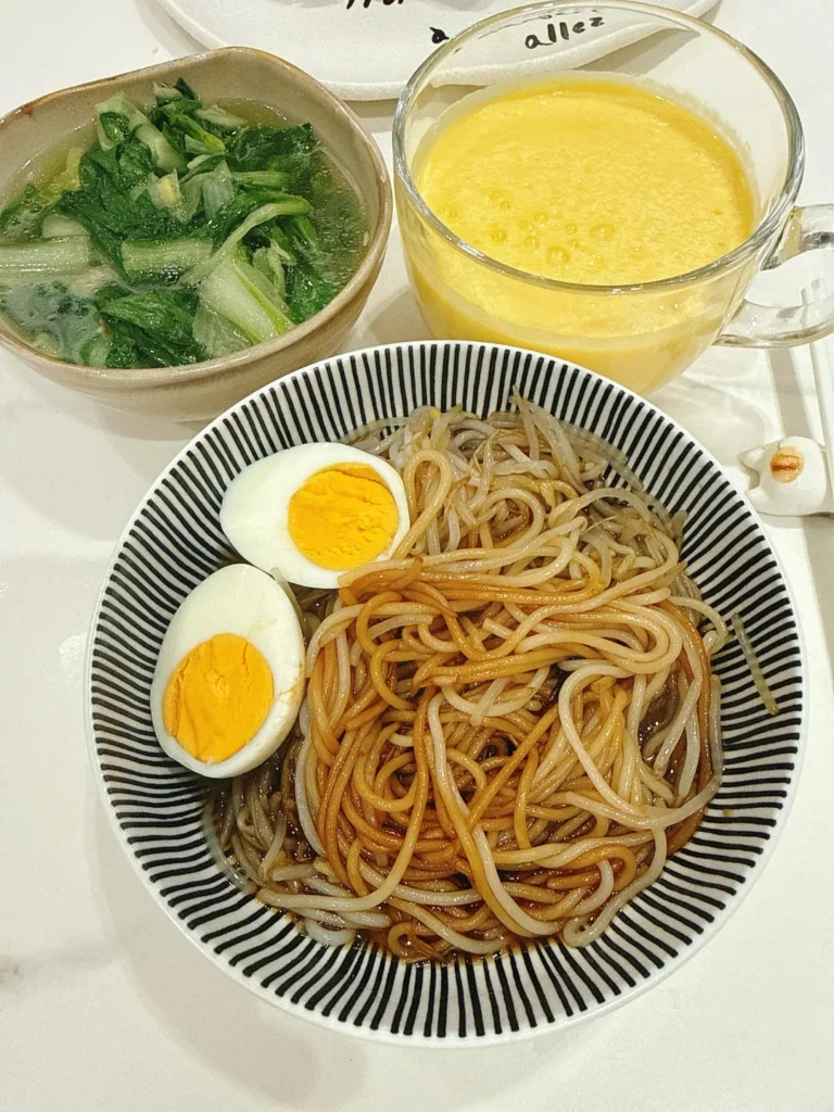 Breakfast: Scallion Oil Rice Noodles, Mango Smoothie, Soft-Centered Egg & Ginger Baby Bok Choy