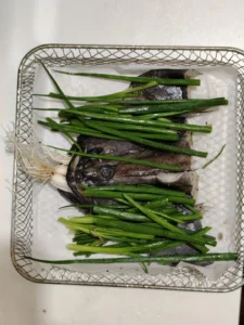 Roasted Halibut Head with Spring Onions