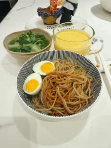 Breakfast: Scallion Oil Rice Noodles, Mango Smoothie, Soft-Centered Egg & Ginger Baby Bok Choy