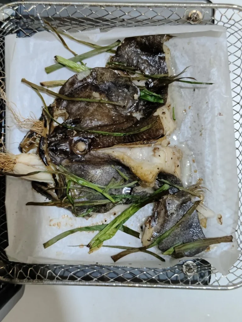 Roasted Halibut Head with Spring Onions
