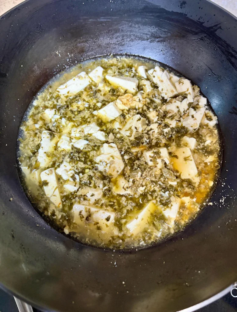Silken Tofu Soup with Preserved Mustard Greens and Minced Pork
