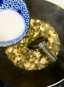 Silken Tofu Soup with Preserved Mustard Greens and Minced Pork
