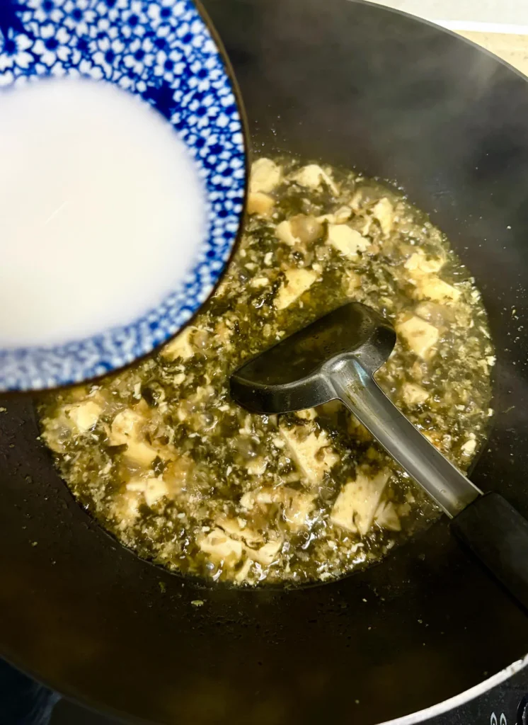 Silken Tofu Soup with Preserved Mustard Greens and Minced Pork