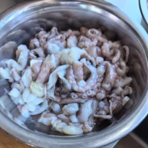 Stir-fried Octopus with Garlic Scapes