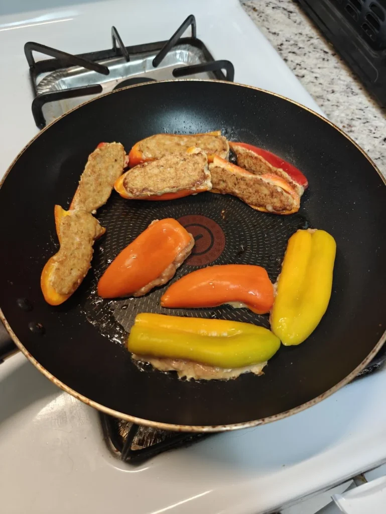 Chicken-Stuffed Mini Bell Peppers & Button Mushrooms with Creamy Tomato Onion Sauce