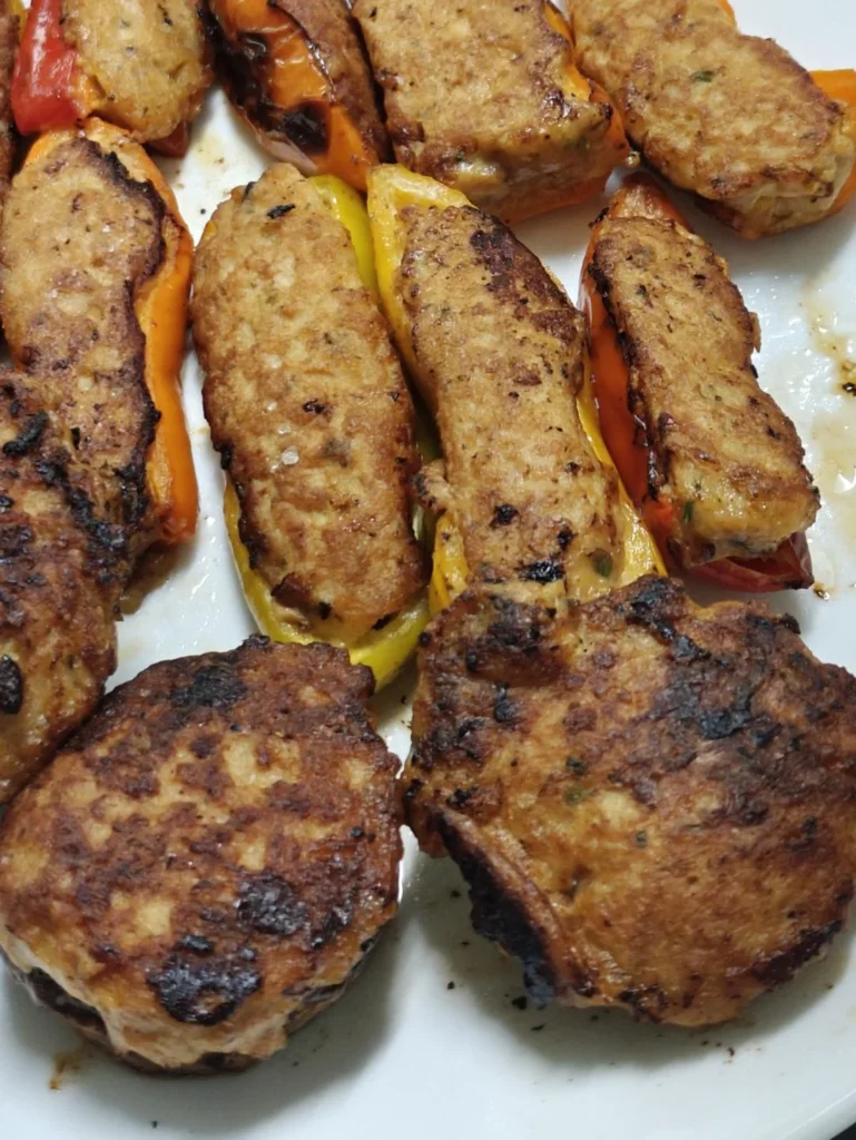 Chicken-Stuffed Mini Bell Peppers & Button Mushrooms with Creamy Tomato Onion Sauce
